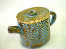 Slab built teapot, experimenting with texture, oxide, glaze.