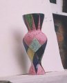 I called my vase Lady, she's tall and beautiful, her dress is like her second skin, it shows her tiny waist and rounded hips. It has the figure of a woman, a young woman waiting to be taken to the dance floor by her lover to dance the night away.